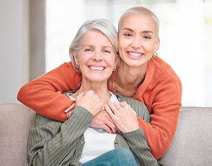 Image showing Shes always been my biggest supporter. Cropped portrait of an attractive young woman and her senior mother sitting on the sofa at home.