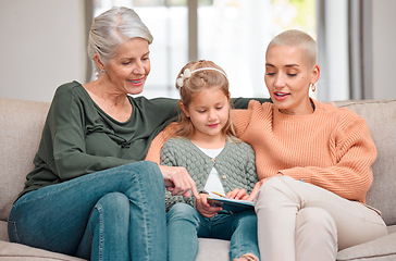 Image showing We have the same taste. a mature woman bonding with her daughter and granddaughter while using a digital tablet.