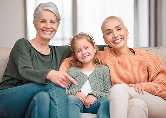 Image showing The ultimate girl time. Portrait of a mature woman bonding with her daughter and granddaughter on the sofa at home.