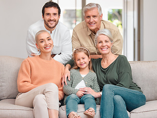 Image showing Weve watched them grow. Portrait of a happy family bonding on the sofa at home.