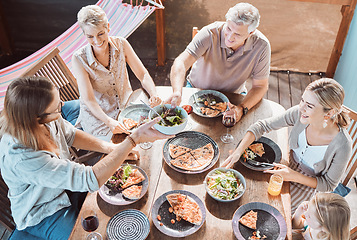 Image showing Memories are made over food. High angle shot of a family sitting together and enjoying lunch.