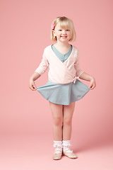 Image showing Leotards make her world go round. cute little girl in her leotard against a studio background.