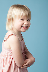 Image showing Youll never guess what I did. a mischievous little girl against a studio background.