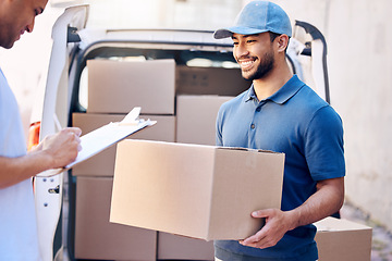 Image showing Men are rich only as they give. a young man receiving his delivery from the courier.