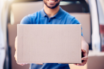 Image showing He who gives great service gets great rewards. a unrecognizable delivery man holding a pile of boxes.