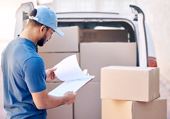 Image showing You earn loyalty day-by-day. a delivery man standing by his van.