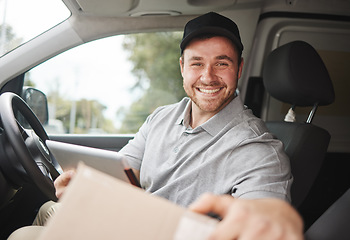 Image showing Ill have this delivered in no time. Cropped portrait of a handsome young delivery man using a tablet while sitting in his van.