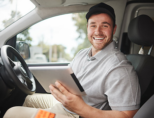 Image showing Just double checking my route. Cropped portrait of a handsome young delivery man using a tablet while sitting in his van.