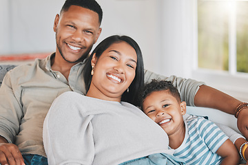 Image showing To be with family is a lovely feeling. Portrait of a happy family relaxing together at home.