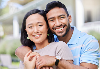 Image showing Every embrace is like the first. a young couple spending time together in the garden at home.