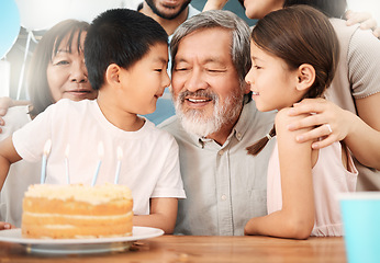 Image showing The old believe everything. a happy family celebrating a birthday at home.