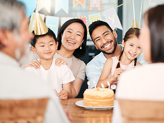 Image showing There is still no cure for the common birthday. a happy family celebrating a birthday at home.