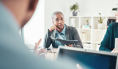 Image showing Do you want to run with this then. an attractive young businesswoman sitting and having a meeting with her colleagues in the office.