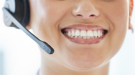 Image showing A satisfied customer brings a smile to my face. Closeup shot of a call center agent smiling.