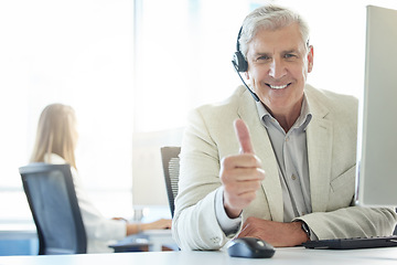 Image showing If youre satisfied then Im happy. a mature man showing thumbs up while working in a call center.