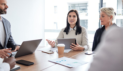 Image showing Theres so much to discuss. a group of businesspeople in a meeting at work.