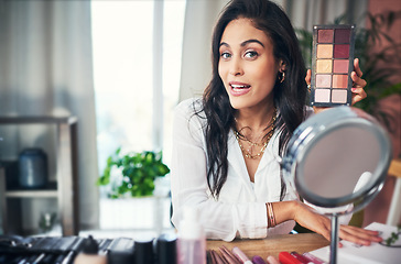Image showing The only drama we want, is on our eyes. a influencer recording a makeup tutorial for her blog at home.