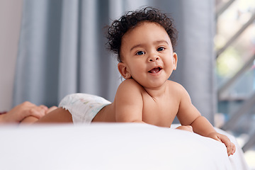 Image showing I mean, have you ever seen anyone cuter. an adorable baby boy on the bed at home.