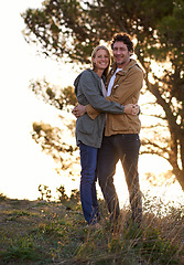 Image showing This is where he proposed. A full length portrait of a happy affectionate couple standing together outdoors.