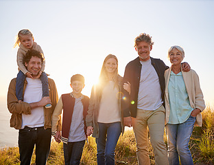 Image showing Family is lifes greatest blessing. Portrait of a happy multi-generational family on an afternoon walk.