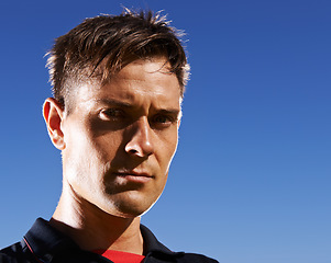 Image showing Focused on the game ahead. Portrait of a handsome young footballer.