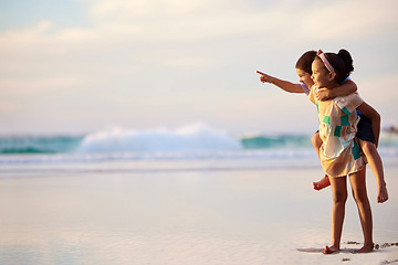 Image showing Light me up with your youth. an adorable brother and sister bonding at the beach.