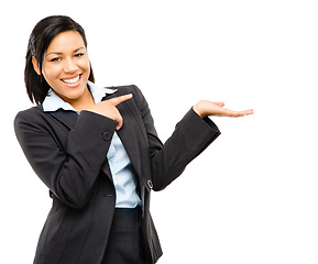 Image showing Take a chance on your ideas. a young businesswoman holding her hands aloft against a studio background.