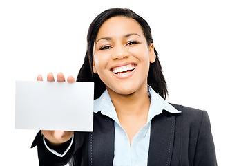 Image showing Call this number when you need her. a young ethnic businesswoman holding up a business card against a studio background.