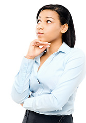 Image showing Happy latin american woman thinking. a young businesswoman thinking against a studio background.