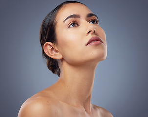 Image showing Start taking proper care of your skin. Studio shot of a beautiful young woman posing against a grey background.