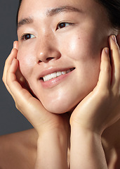 Image showing I have a good skincare routine to thank. Closeup shot of a beautiful young woman with freckles on her face.