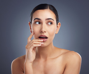 Image showing Theres a new favourite skincare product in town. Studio shot of a beautiful young woman posing against a grey background.