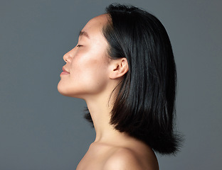 Image showing One word... flawless. Studio shot of a beautiful young woman posing against a grey background.