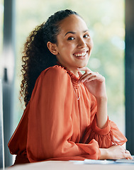 Image showing Here to make my mark. Cropped portrait of an attractive young businesswoman sitting at her desk in the office.