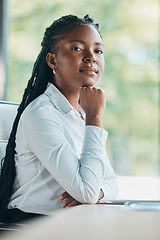 Image showing Im here to fulfil my career goals. Cropped portrait of an attractive young businesswoman sitting at her desk in the office.