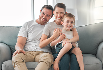 Image showing Every second with them is precious. a young family relaxing together at home.