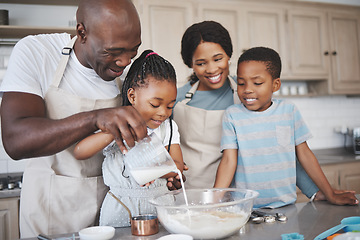 Image showing A bond everyone strives for. a family baking together in the kitchen.