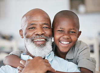 Image showing Live your life with love. a boy and his grandpa bonding at home.