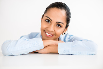 Image showing Give yourself room to flourish. a young businesswoman resting at her desk.