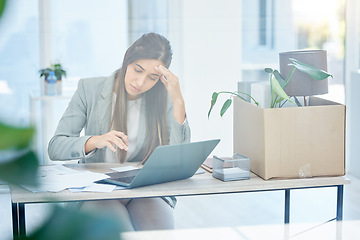 Image showing Time to get to work. a young businesswoman looking overwhelmed in an office at work.