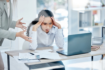 Image showing Theres too much going on. a young businesswoman feeling overwhelmed in a demanding work environment.