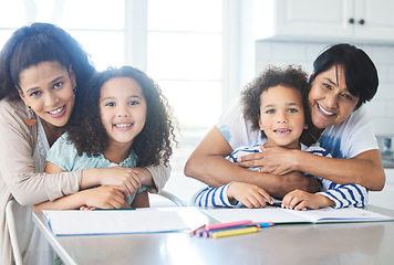 Image showing Quick squeezes between classes. a beautiful family doing homework together at the kitchen table.