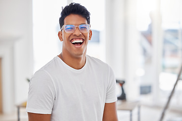 Image showing Happiness is contagious and Im passing it on. a handsome young man standing in a room under renovations.