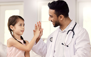 Image showing Youre doing so much better than last time. a male doctor visiting a little girl at home.