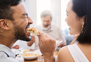 Image showing The only institution I know that works, is the family. a young couple have some lunch with the family at home.