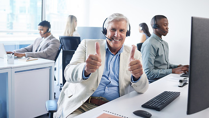 Image showing With us, expect the best. a mature businessman using a headset and showing thumbs up in a modern office.