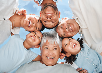 Image showing They are the people who support me when I need it. a multi-generational family standing together in a huddle.