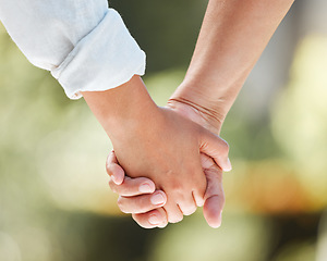 Image showing You give me love. an unrecognizable couple holding hands.