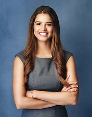 Image showing Self awareness is key to success. Studio portrait of a confident young businesswoman posing against a grey background.