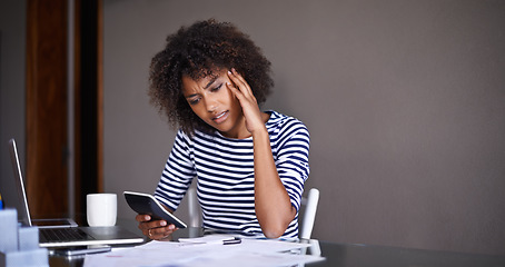 Image showing Doing business from the comfort of home. an attractive young woman working at home.